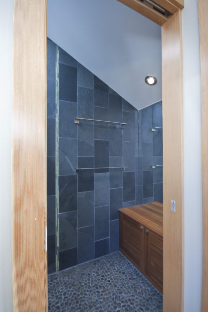 Pebble tile shower room