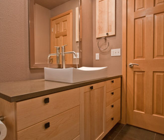 vessel sink and square black cabinet knobs