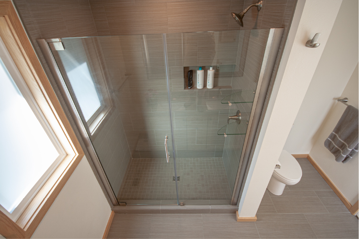 Heavy glass shower enclosure