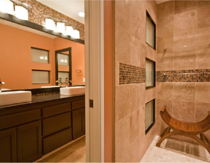 Teak shower seat with triple windows and glass mosaic tile