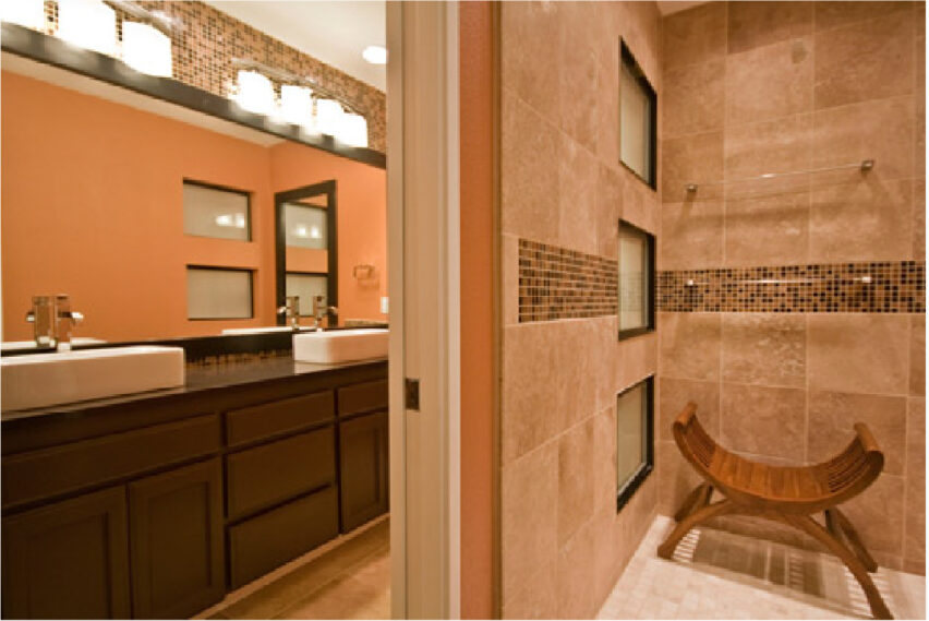 Teak shower seat with triple windows and glass mosaic tile