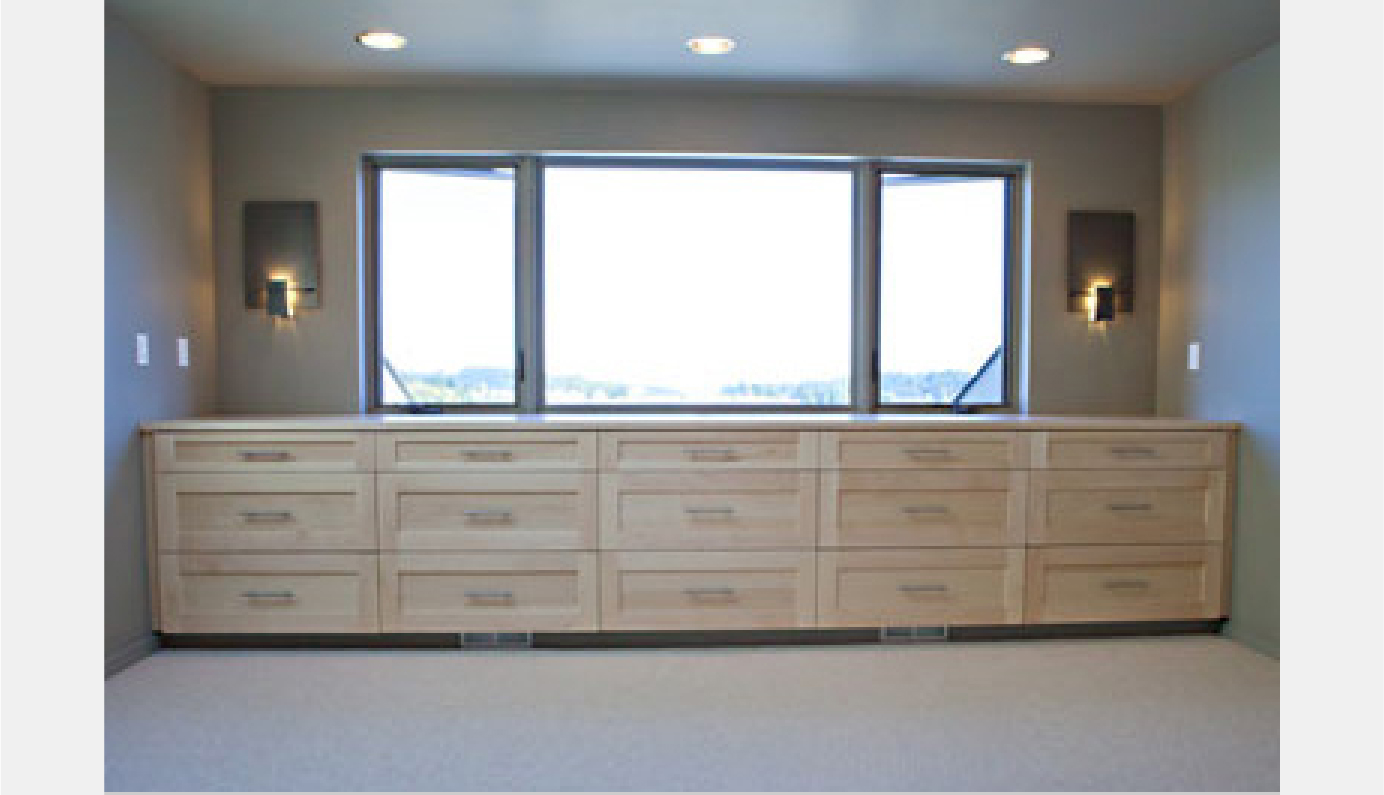 Built in master bedroom dressers and steel art sconces