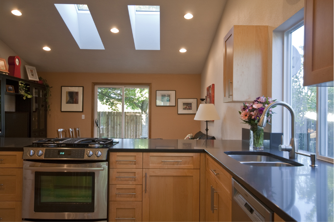 Downdraft gas range in kitchen peninsula