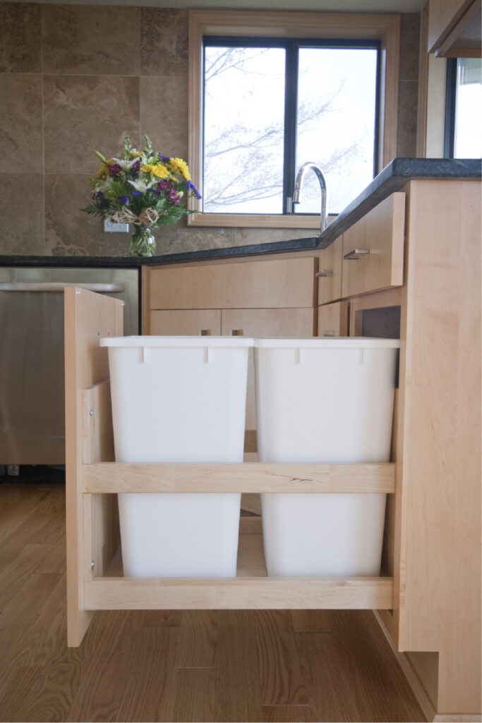 Tidy garbage and recycling storage.  