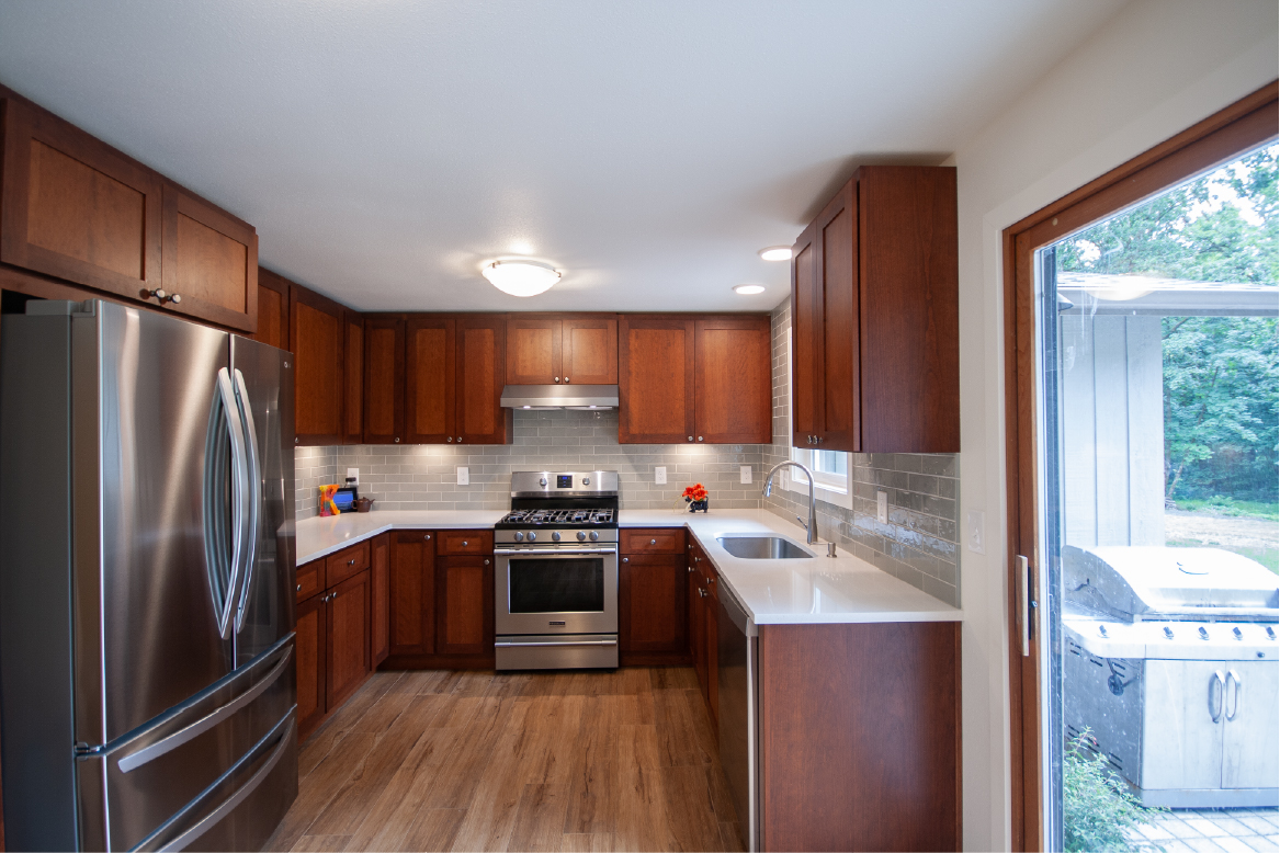 kitchen with green subway tile