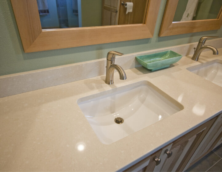 Caesarstone quartz counters with undermount sinks.