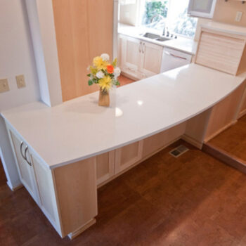 Curved kitchen bar with storage underneath