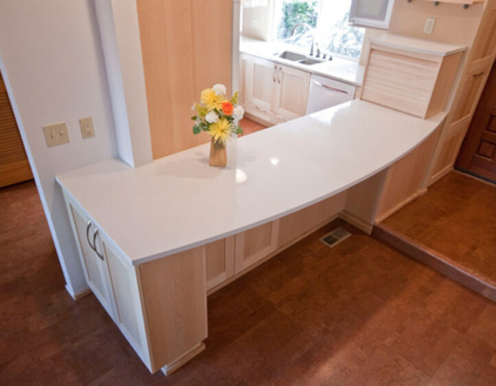 Curved kitchen bar with storage underneath