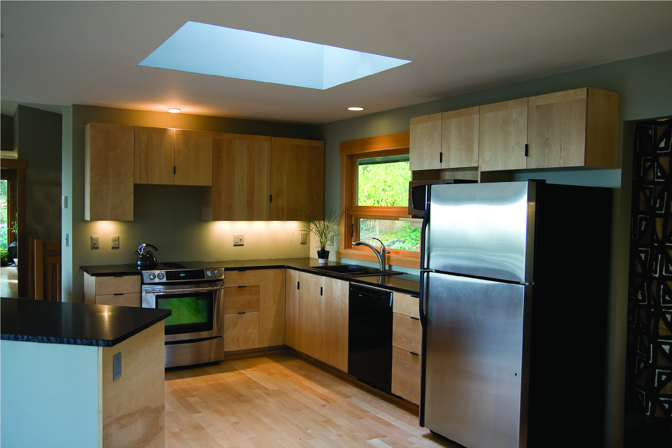 Slab front maple kitchen cabinets