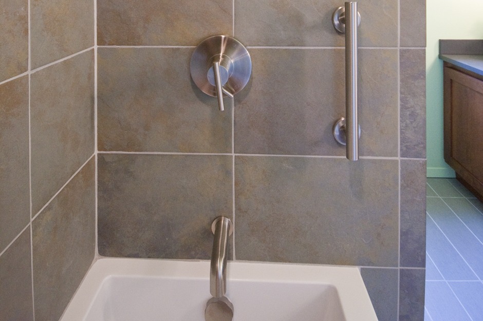 Tub/ shower refresh with tile surround.