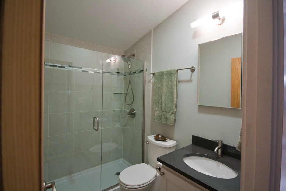 small but mighty bathroom remodel with tile shower surround