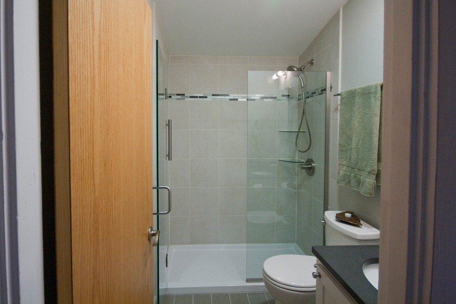 glass tile accent band, flush natural wood door