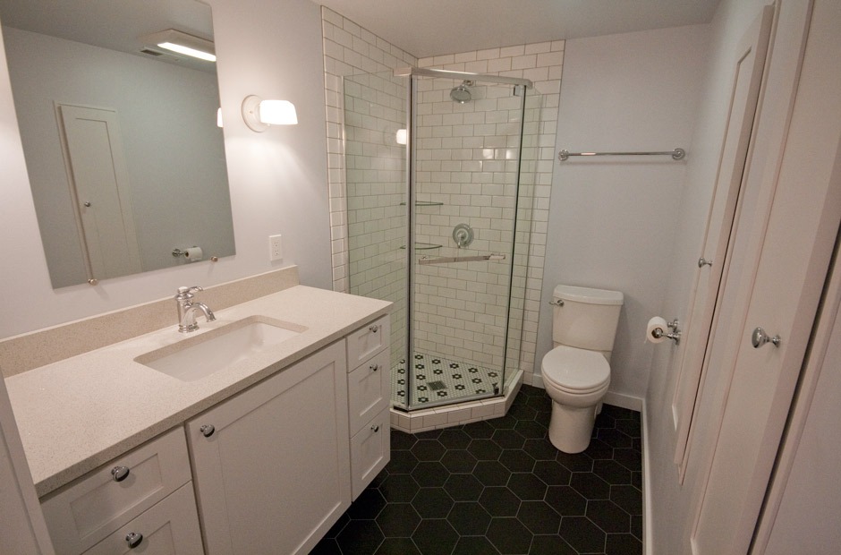 Bismarck ND bathroom remodel: black and white bathroom remodel with neo angle shower