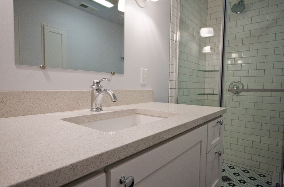 bath room remodel with sparkly white quartz counter