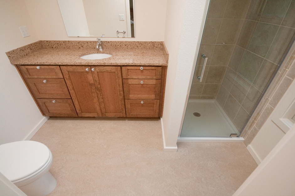 Complete bathroom remodel with Marmoleum sheet flooring.
